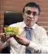  ?? ?? Chairman/Managing Director at Uswatte Confection­ery Works Pvt Ltd. Mr. Quintus Perera with the newly launched Manna Cracker