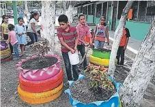  ?? FOTO: EL HERALDO ?? Niños del Comité Ambiental en la jornada de siembra de plantas.