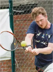  ??  ?? Powerful Luke Quigley fires down a shot from the baseline against Alan McNamee in the men’s final