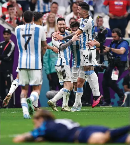  ?? ?? Lionel Messi celebrates with Luka Modric in the foreground, 16 years after their first meeting in Switzerlan­d ( inset)