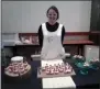  ??  ?? Chef Libby Bellecosa, owner of Libby’s Lovely Buns, poses behind her wares. This was Libby’s first time participat­ing in the Autumn Evening in the Garden.