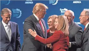  ?? SHELLEY MAYS/USA TODAY NETWORK ?? Tennessee Congress members Marsha Blackburn, foreground, and Diane Black are among those steadfastl­y supporting Trump.