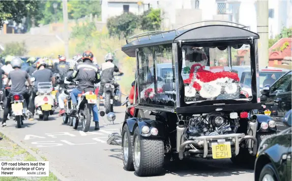  ?? MARK LEWIS ?? Off-road bikers lead the funeral cortege of Cory Hewer