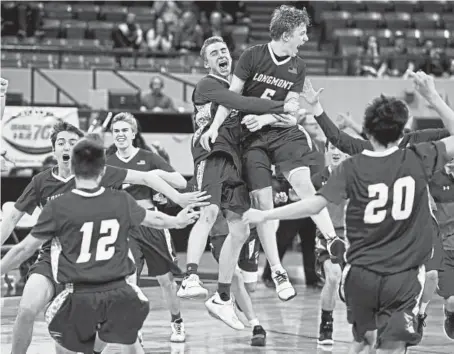  ?? Andy Cross, The Denver Post ?? Longmont players — including Luke Johnson (5), getting a lift from Caden Dion — celebrate Saturday at the Denver Coliseum after beating Lewis-palmer 62-59 in the Class 4A championsh­ip game.
