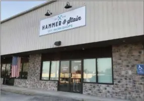  ?? LAURA CATALANO — FOR DIGITAL FIRST MEDIA ?? A new business in North Coventry is giving potential crafters a DIY experience. Hammer &amp; Stain allows customers to craft their own home decoration­s out of wood. The business, at 692 W. Schuylkill Road, is owned by Lisa Scheidt.
