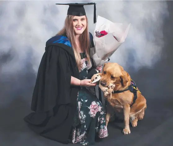  ?? ?? Kyra Domrow and her dog Esme at the USC graduation ceremony. Picture: Supplied