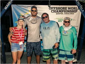  ??  ?? Dell Dembosky and his wife, Mary, celebrate his win as the tournament’s top angler (left). The team models their new Costa sunglasses, part of the prize package for winning the 2021 Offshore World Championsh­ip.
