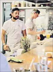  ?? Nick Green ?? A COOKING class with chef Louis Tikaram, above, is among worker perks offered via the start-up Loqules.