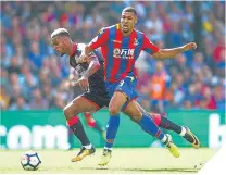  ??  ?? ■ Ruben Loftus-Cheek tackles Steve Mounie.