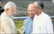  ??  ?? PM Modi with West Bengal governor KN Tripathi (left) and finance minister Amit Mitra at NSCBI Airport in Kolkata on Saturday. PTI