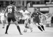  ?? ISI PHOTOS ?? Orlando's Christine Nairn, right, battles Sky Blue FC's Imani Dorsey for the ball during the teams' matchup last month.