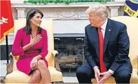  ?? [AP PHOTO] ?? President Donald Trump meets with outgoing U.S. Ambassador to the United Nations Nikki Haley in the Oval Office of the White House on Tuesday in Washington.