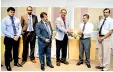  ??  ?? Picture shows the CEB Chairman and the General Manager receiving the units from Dr. Narendra of ERLPT and Collin Fernando – MD and other directors of STIPL.