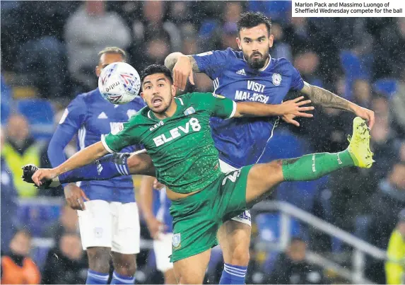  ??  ?? Marlon Pack and Massimo Luongo of Sheffield Wednesday compete for the ball