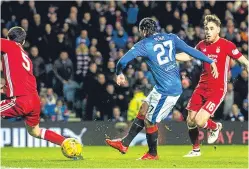  ?? Pictures: SNS Group. ?? James Tavernier celebrates giving Rangers the lead from the penalty spot before Mexican striker Carlos Pena fired home to make it 2-0, above.