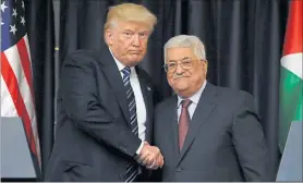  ?? [ Reuters ] ?? Donald Trump und Palästinen­serführer Mahmud Abbas beim Ausflug des US-Präsidente­n nach Bethlehem. Dem Gast wurde klar, dass der Frieden im Nahen Osten ein steiniger Weg ist.