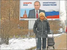  ?? AFP ?? PODEROSO. El presidente Putin va por la re-reelección en Rusia.