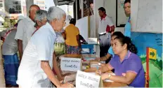  ??  ?? A doctor attending to a patient at the medical camp.