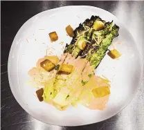  ?? ?? Charred Caesar salad made by Electric Playhouse’s chef Steven Lujan.