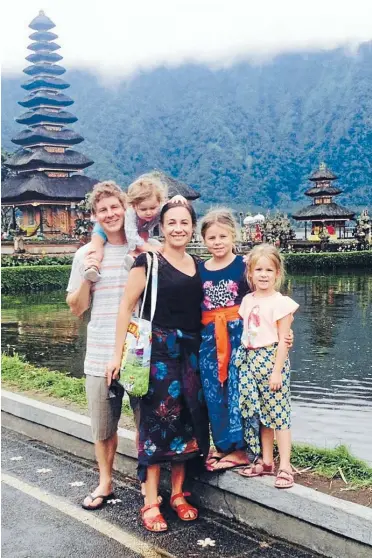  ??  ?? Hamish Judson, Cate Campbell and their kids Olive, 2, Ruby, 8, and Rose, 6, visit a temple.