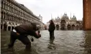  ??  ?? St Mark’s Square flooded by the high tide. Photograph: Andrea Pattaro/AFP/Getty Images