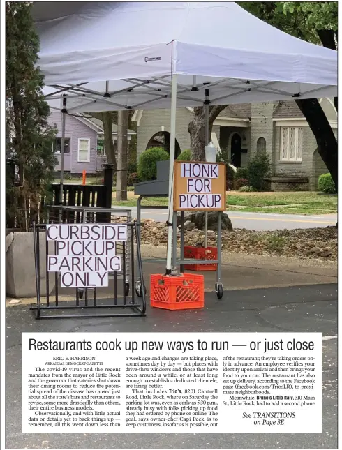  ?? (Arkansas Democrat-Gazette/Eric E. Harrison) ?? The Pizzeria on Kavanaugh Boulevard in Little Rock’s Pulaski Heights has set up a parking-lot pickup station so customers don’t have to enter the restaurant.