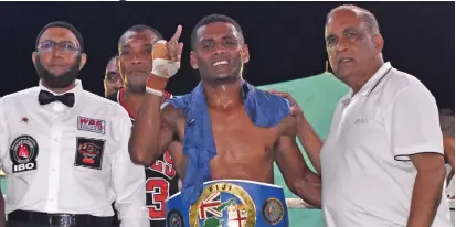  ?? Photo: Waisea Nasokia ?? Jese Ravudi (second from right) won the middleweig­ht title at the Prince Charles Park, Nadi on December 17, 2022.