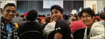  ?? TY TAGAMI / TTAGAMI@AJC.COM ?? Alpharetta High School students (from left) Varun Kashyap, 14, Nikhil Dasari, 15, and Rishab Seshadri, 15, are seconds away from the big reveal at Kennesaw State University for this year’s FIRST Tech Challenge, a robotics competitio­n founded by Dean Kamen, known for, among other things, inventing the Segway.