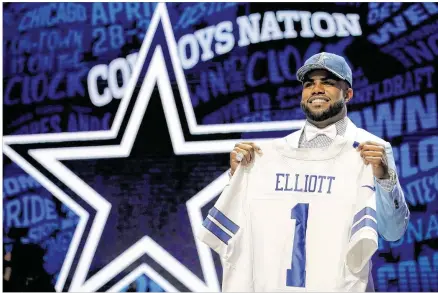  ?? GETTY IMAGES ?? Ohio State running back Ezekiel Elliott will team with quarterbac­k Tony Romo and wide receiver Dez Bryant to give Dallas its best trio of skillposit­ion players since the 1990s Super Bowl teams. “I’m ready for the challenge,” Elliott said after being...