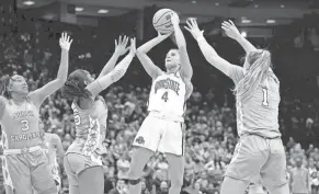  ?? KYLE ROBERTSON/COLUMBUS DISPATCH ?? Ohio State guard Jacy Sheldon makes the game-winning shot against North Carolina to send the Buckeyes to their second straight Sweet 16.