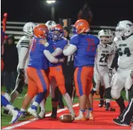  ??  ?? Oneida offensive linemen Braydon DiSalvo (70) and Mayson Earl (75) mob quarterbac­k Jordan Clark following a second half touchdown against Marcellus during Class B semifinal play on Friday, Nov. 1.