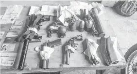  ?? PHOTO COURTESY OF PHL ARMY 61ST IB ?? Some of the items recovered by government troops from the hideout of NPA rebels, seven of who were killed in a gunbattle at San Jose, Antique.