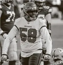  ?? Dylan Buell / Getty Images ?? Shaquil Barrett struts after a sack of Aaron Rodgers, one of his three in the NFC title game that added to a superlativ­e season.