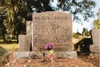 ?? DOUGLAS R. CLIFFORD/AP ?? A granite headstone marks the burial site of Wilburt Brooks, an AfricanAme­rican sponge diver whose remains are interred at Rose Cemetery, 124 N Jasmine Ave. in Tarpon Springs.