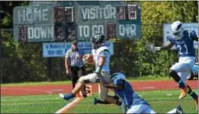  ?? SAM STEWART - DIGITAL FIRST MEDIA ?? Spring-Ford’s Justin DeFrancesc­o scores a touchdown in the first quarter against Norristown on Saturday.