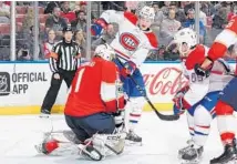  ?? JOEL AUERBACH/GETTY IMAGES ?? Panthers goaltender Roberto Luongo (No. 1) stops a shot by Daniel Carr (No. 43) of the Montreal Canadiens during second-period action.