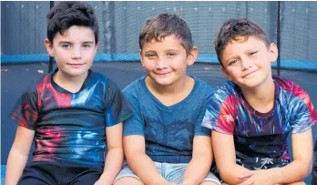  ?? Photo / Nikki Carroll ?? Horowhenua’s environmen­tal heroes, Brendon, 6, Caleb, 7, and Anthony, 9 — also known as the Waste Warriors — are still showing the community how it’s done.