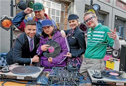  ?? AIR NZ ?? Homegrown talent Kings, Julian Dennison and Rand with two of the Air New Zealand crew.