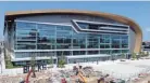  ?? PHOTO BY CHELSEY LEWIS AND MIKE DE SISTI / MILWAUKEE JOURNAL SENTINEL ?? A drone aerial view on Aug. 8 of the Milwaukee Bucks Fiserv Forum.