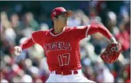  ?? BEN MARGOT — THE ASSOCIATED PRESS ?? In this Feb. 24, 2018, file photo, Los Angeles Angels’ Shohei Ohtani works against the Milwaukee Brewers during the first inning of a spring training baseball game, in Tempe, Ariz.