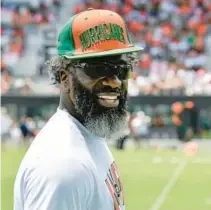  ?? MICHAEL LAUGHLIN/SOUTH FLORIDA SUN SENTINEL ?? Ed Reed stands on the sidelines during Miami’s spring game on April 16 at DRV PNK Stadium.