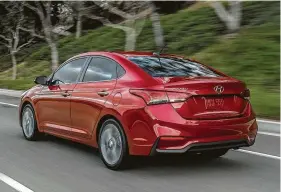  ??  ?? The new Accent is powered by a 1.6-liter four-cylinder engine with gasoline direct injection that delivers 130 horsepower at 6,300 rpm along with 119 lb.-ft. of torque at 4,850 rpm.