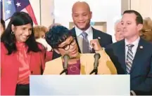  ?? AMY DAVIS/BALTIMORE SUN ?? Maryland House of Delegates Speaker Adrienne A. Jones gestures to Gov. Wes Moore, behind her, during a news conference in support of bills to protect access to abortion.