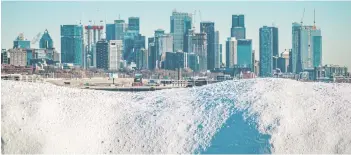  ?? — AFP photos ?? Aerial picture of snow removal operation in Montreal.