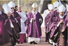  ?? Gabriel Bouys / AFP / Getty Images ?? Pope Francis arrives Tuesday at Venustiano Carranza Stadium to celebrate Mass with Mexico’s priests, nuns and seminarian­s in Morelia. He urged them to fight injustice and resignatio­n.