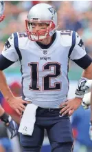  ??  ?? Patriots quarterbac­k Tom Brady (12) continues to thrive in the NFL at 40 years old. BRAD PENNER/USA TODAY SPORTS