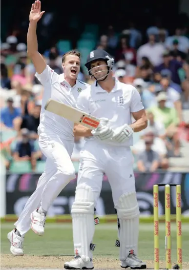  ?? AP ?? GIMME A HIGH FIVE: Morné Morkel celebrates as Nick Compton is dismissed yesterday. Morkel missed out on a hat-trick after sending the durable Compton back to the pavilion, 15 runs short of a hundred.