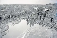  ??  ?? WAVES OF LOSS: James Rendall, whose body was never found; funeral procession for the Arbroath lifeboatme­n lost in the disaster; and scenes from the aftermath as the lifeboat Robert Lindsay is righted.