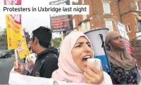  ??  ?? Protesters in Uxbridge last night