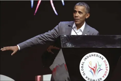  ??  ?? Former U.S. President Barack Obama gestures as he delivers his
Indonesian Diaspora Network in Jakarta, Indonesia on Saturday. AP PHOTO/ACHMAD IBRAHIM